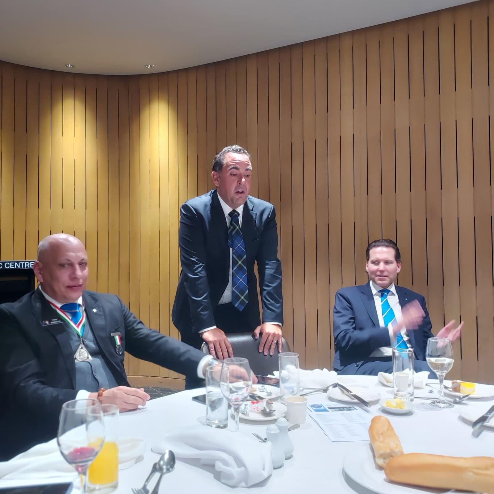 A brother addressing the festive board