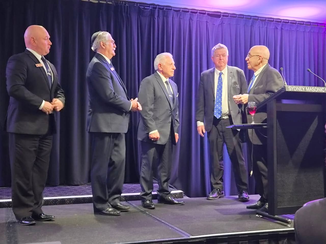 Brethren at a presentation on the dais